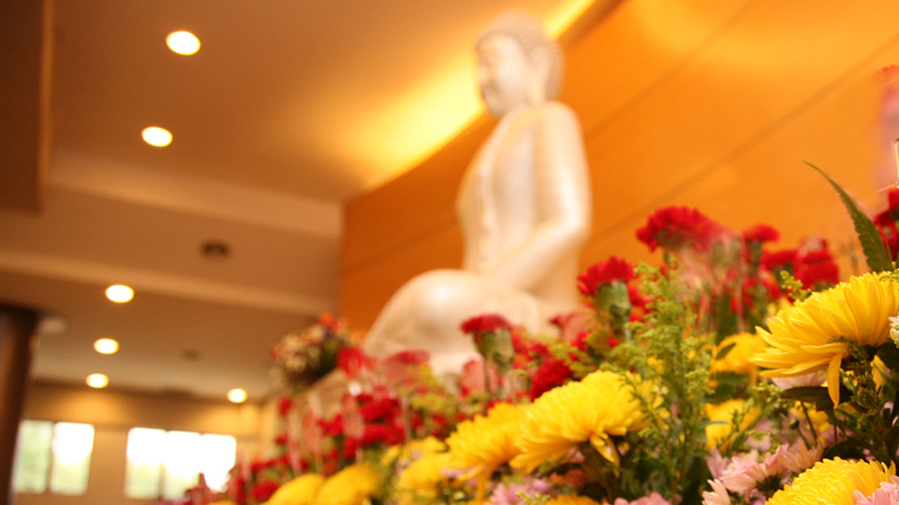 Soft dreamy image of bright candlelight from burning tea light c